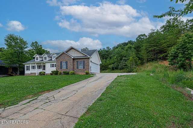 200 W Park Cir, Decatur, TN 37322 - view of front of home with brick siding, a front lawn, and driveway