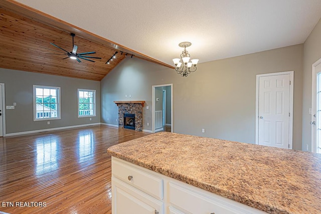200 W Park Cir, Decatur, TN 37322 - kitchen with vaulted ceiling, track lighting, a chandelier, light wood-type flooring, and ceiling fan