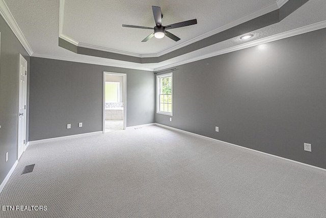 200 W Park Cir, Decatur, TN 37322 - spare room featuring a tray ceiling, crown molding, a ceiling fan, carpet floors, and a textured ceiling