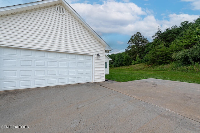 200 W Park Cir, Decatur, TN 37322 - garage with concrete driveway