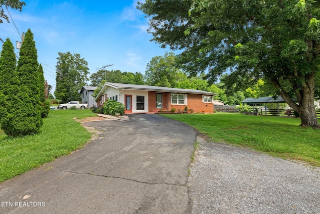 132 County Road 79, Riceville, TN 37370 - ranch-style home featuring driveway and brick siding