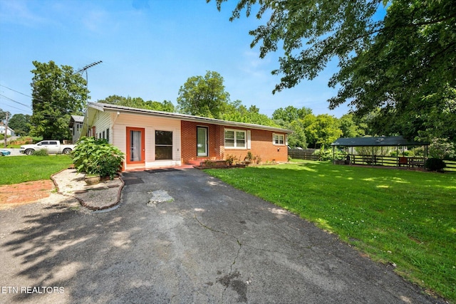 132 County Road 79, Riceville, TN 37370 - ranch-style house with brick siding, a gazebo, and asphalt driveway