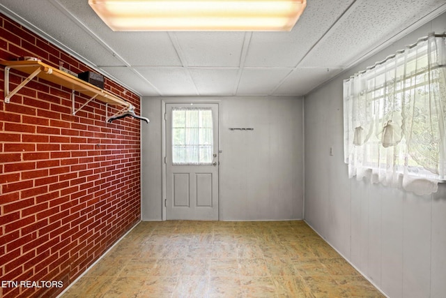 132 County Road 79, Riceville, TN 37370 - entryway featuring brick wall and a drop ceiling