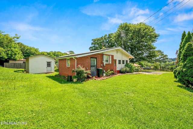 132 County Road 79, Riceville, TN 37370 - back of property featuring brick siding