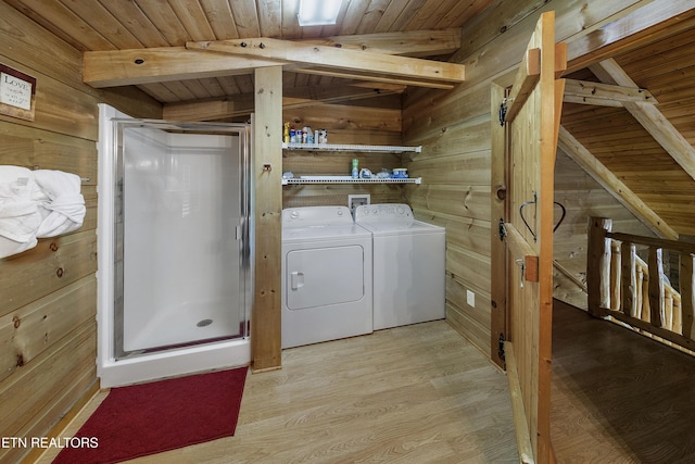 2526 N School House Gap Rd, Sevierville, TN 37876 - laundry room featuring independent washer and dryer, wooden ceiling, wood walls, and light wood-type flooring