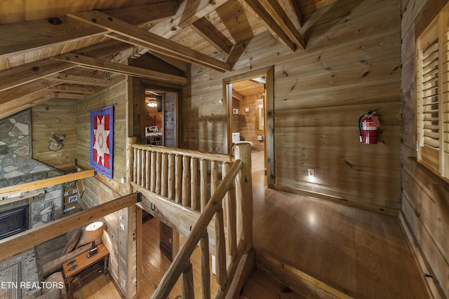 2526 N School House Gap Rd, Sevierville, TN 37876 - staircase with wooden walls, wood finished floors, and wooden ceiling