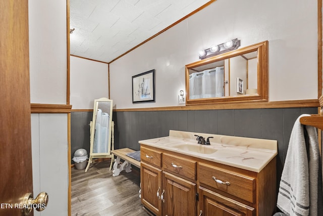 4720 Laws Rd, Del Rio, TN 37727 - bathroom featuring vanity, ornamental molding, wainscoting, and wood finished floors