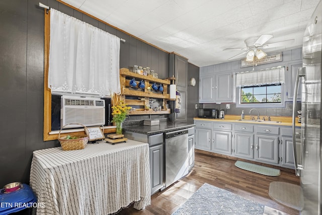 4720 Laws Rd, Del Rio, TN 37727 - kitchen featuring stainless steel appliances, gray cabinetry, wood finished floors, and a ceiling fan