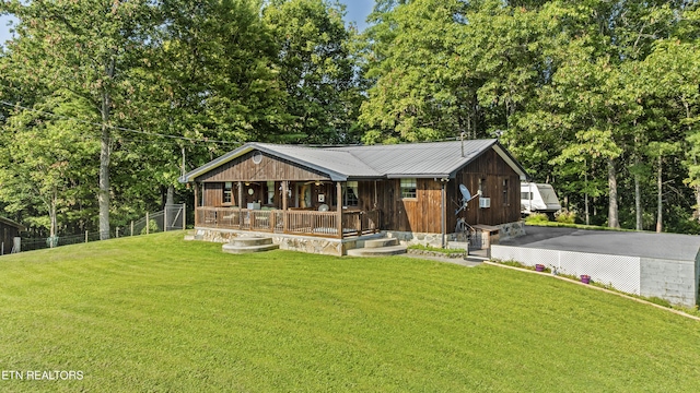 4720 Laws Rd, Del Rio, TN 37727 - chalet / cabin featuring a porch, a metal roof, and view of wooded area