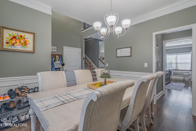 1221 Sky Top Ln, Powell, TN 37849 - dining space with ornamental molding, a chandelier, a wainscoted wall, dark wood-type flooring, and a decorative wall