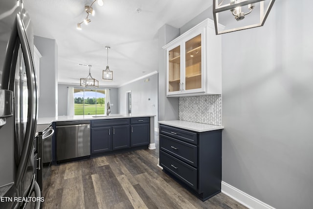 545 Rarity Bay Pkwy Unit 103, Vonore, TN 37885 - kitchen featuring stainless steel dishwasher, freestanding refrigerator, light countertops, and a peninsula