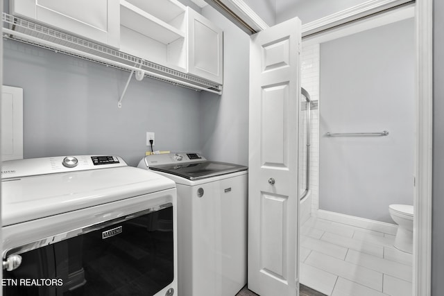 545 Rarity Bay Pkwy Unit 103, Vonore, TN 37885 - laundry area featuring independent washer and dryer and baseboards