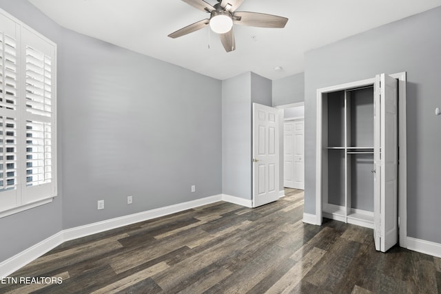 545 Rarity Bay Pkwy Unit 103, Vonore, TN 37885 - unfurnished bedroom featuring dark wood finished floors, a ceiling fan, and a closet