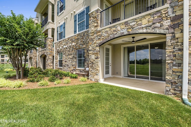 545 Rarity Bay Pkwy Unit 103, Vonore, TN 37885 - entrance to property with stone siding, stucco siding, and a lawn