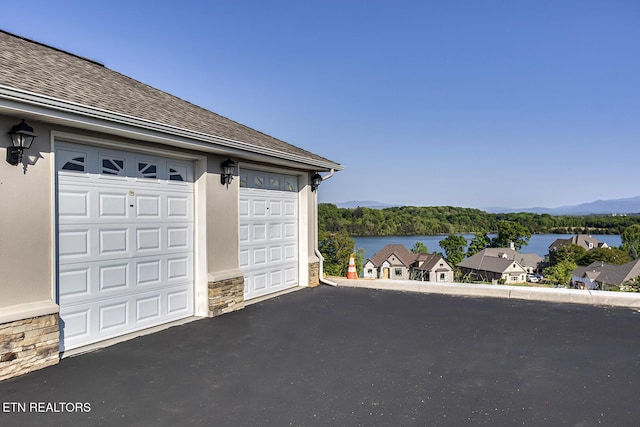 545 Rarity Bay Pkwy Unit 103, Vonore, TN 37885 - garage with a water view