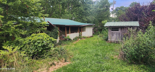 229 Obis Bowling Rd, Robbins, TN 37852 - view of yard with a storage shed