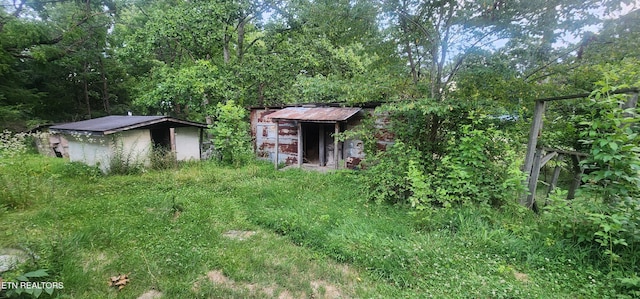 229 Obis Bowling Rd, Robbins, TN 37852 - view of yard with a storage unit