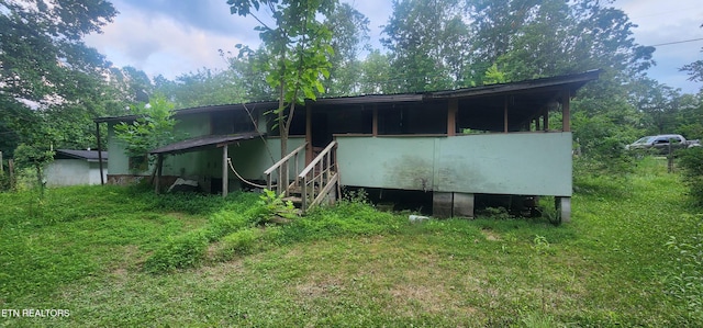 229 Obis Bowling Rd, Robbins, TN 37852 - back of property with stairway