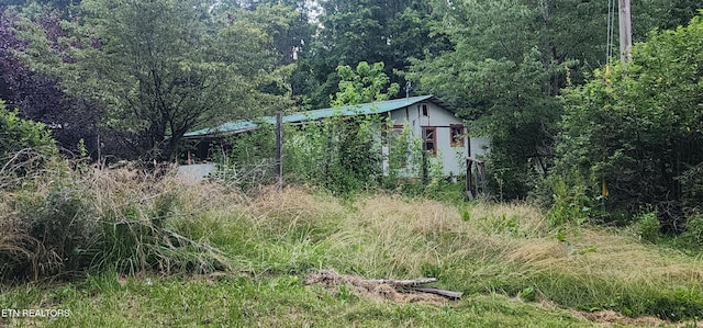 229 Obis Bowling Rd, Robbins, TN 37852 - view of outbuilding with a wooded view