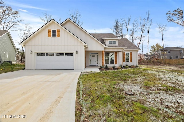 2297 Lopez Ct, Cookeville, TN 38506 - modern farmhouse style home with driveway, an attached garage, and a shingled roof