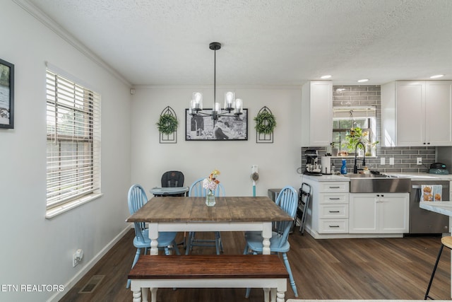 124 Pheasant Rd, Clinton, TN 37716 - dining area featuring dark wood-style flooring, a textured ceiling, ornamental molding, a chandelier, and recessed lighting