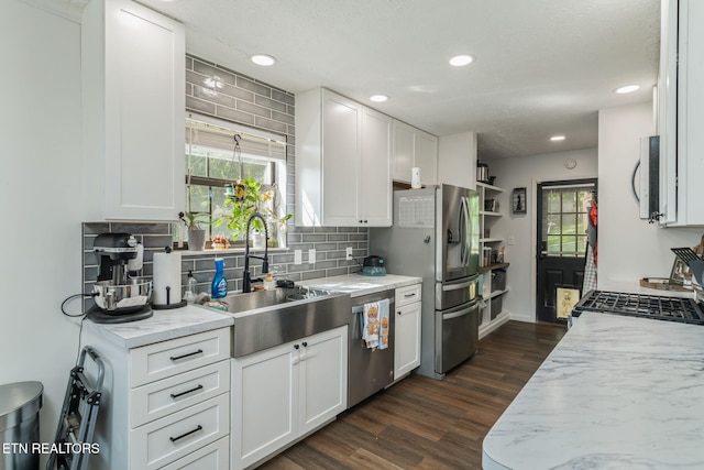 124 Pheasant Rd, Clinton, TN 37716 - kitchen with appliances with stainless steel finishes, backsplash, white cabinetry, dark wood-style flooring, and recessed lighting