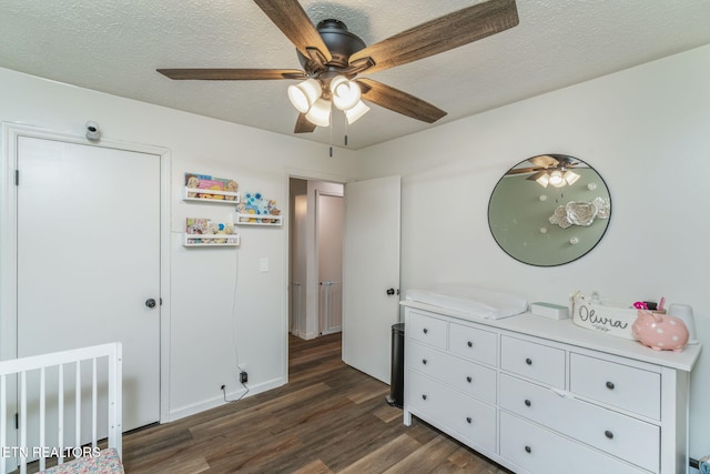 124 Pheasant Rd, Clinton, TN 37716 - bedroom with dark wood-style flooring, a textured ceiling, and ceiling fan