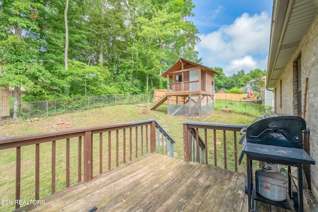 124 Pheasant Rd, Clinton, TN 37716 - deck featuring a fenced backyard, a grill, and a playground