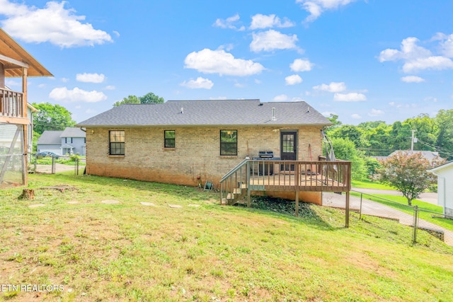 124 Pheasant Rd, Clinton, TN 37716 - back of house with a deck, a fenced backyard, brick siding, and roof with shingles