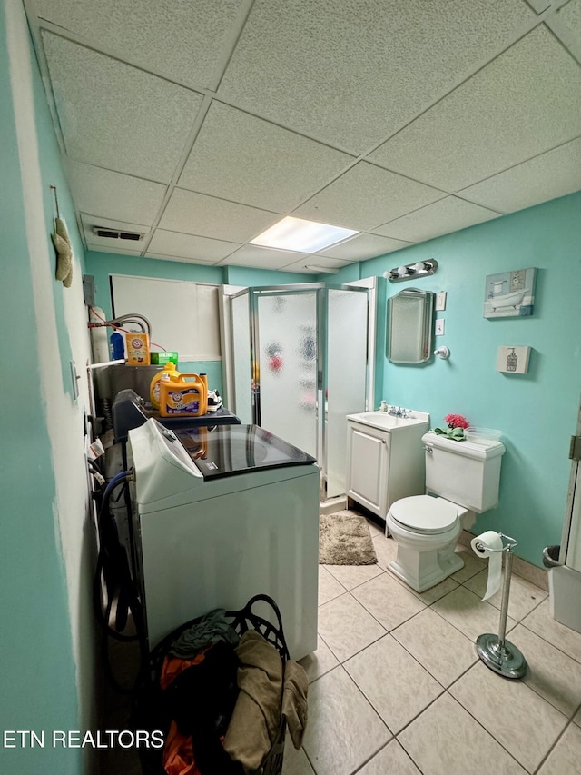 103 Albany Rd, Oak Ridge, TN 37830 - washroom featuring light tile patterned flooring and washer and clothes dryer