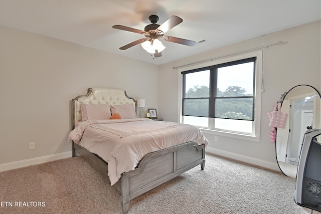 11957 Lakehurst Ln, Knoxville, TN 37934 - bedroom with light colored carpet and ceiling fan