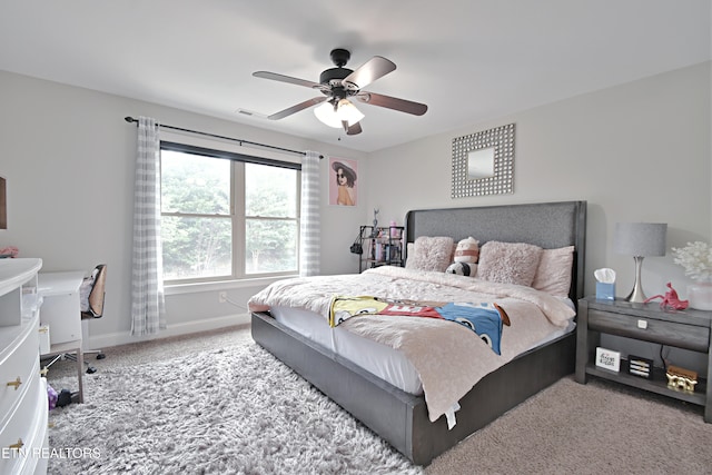 11957 Lakehurst Ln, Knoxville, TN 37934 - carpeted bedroom with baseboards and a ceiling fan