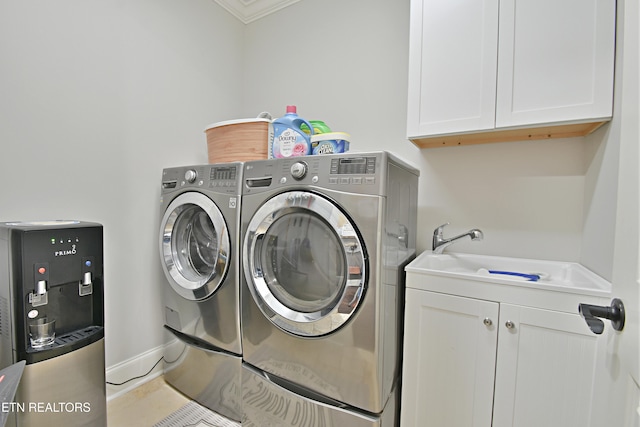 11957 Lakehurst Ln, Knoxville, TN 37934 - laundry room with cabinet space, washing machine and dryer, and crown molding