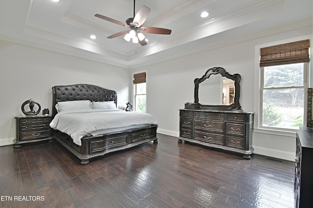 11957 Lakehurst Ln, Knoxville, TN 37934 - bedroom featuring a tray ceiling, dark wood-type flooring, crown molding, recessed lighting, and ceiling fan