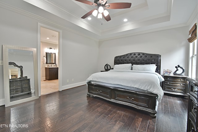 11957 Lakehurst Ln, Knoxville, TN 37934 - bedroom with a tray ceiling, dark wood-type flooring, ornamental molding, connected bathroom, and a ceiling fan