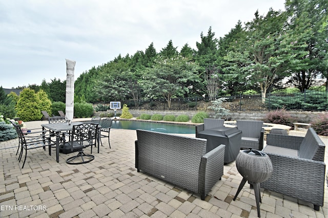 11957 Lakehurst Ln, Knoxville, TN 37934 - view of patio / terrace with outdoor dining area and an outdoor pool