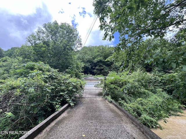 435 Simms Fork Rd, Arjay, KY 40902 - view of street with a gated entry and a gate