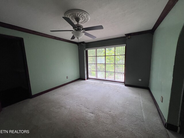 435 Simms Fork Rd, Arjay, KY 40902 - carpeted spare room with baseboards and a ceiling fan