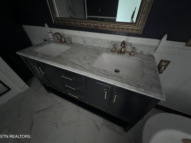 435 Simms Fork Rd, Arjay, KY 40902 - bathroom featuring double vanity, marble finish floors, and a tub to relax in