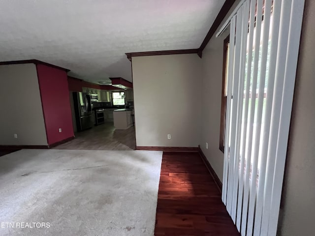 435 Simms Fork Rd, Arjay, KY 40902 - unfurnished living room with ornamental molding and light wood finished floors