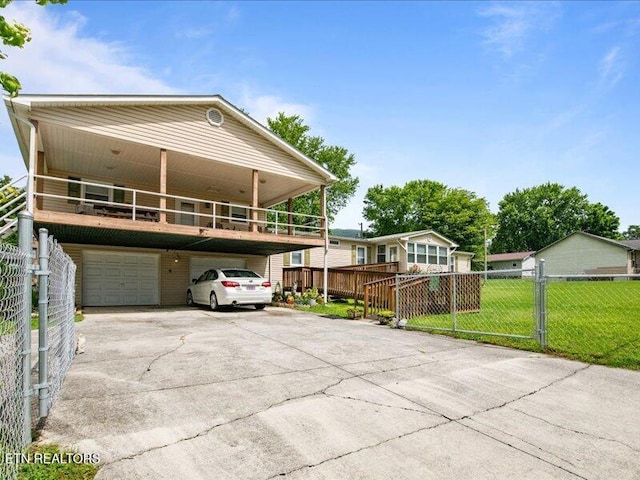 205 Ellison Rd, Lafollette, TN 37766 - view of front of home with concrete driveway and an attached garage