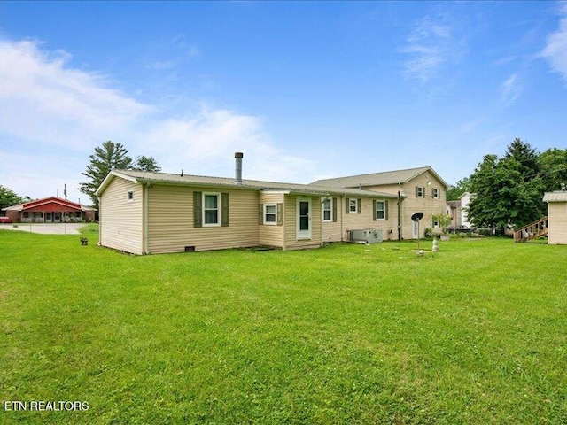205 Ellison Rd, Lafollette, TN 37766 - back of property with a yard