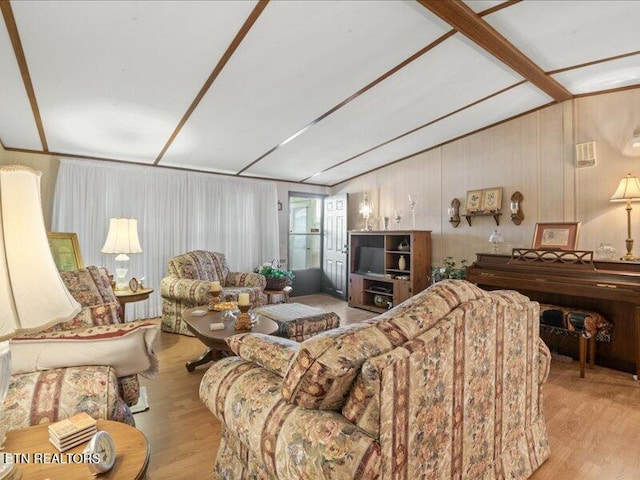 205 Ellison Rd, Lafollette, TN 37766 - living area with wood finished floors and vaulted ceiling