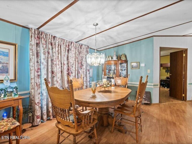 205 Ellison Rd, Lafollette, TN 37766 - dining room featuring crown molding, a chandelier, and wood finished floors