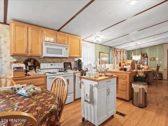 205 Ellison Rd, Lafollette, TN 37766 - kitchen featuring white appliances, light wood-type flooring, a chandelier, a kitchen island, and wallpapered walls