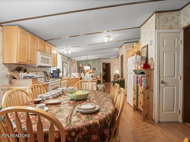 205 Ellison Rd, Lafollette, TN 37766 - dining room featuring wallpapered walls and light wood-type flooring