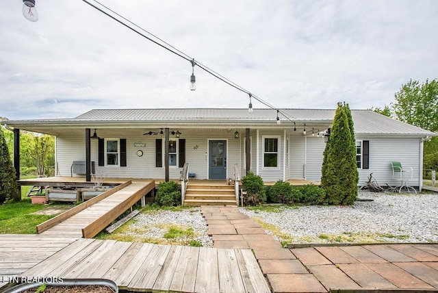 4148 New Home Rd, Smithville, TN 37166 - view of front of home with a porch, a ceiling fan, and a metal roof