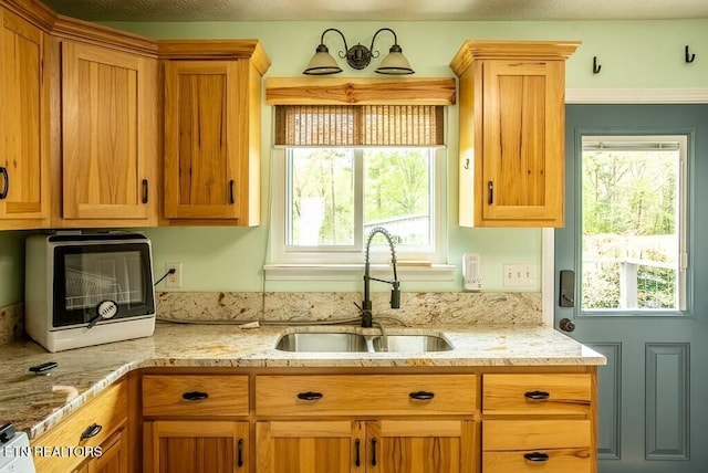 4148 New Home Rd, Smithville, TN 37166 - kitchen featuring a sink and light stone countertops