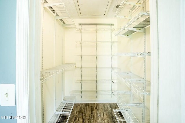 4148 New Home Rd, Smithville, TN 37166 - walk in closet featuring wood finished floors and attic access