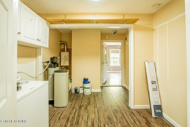 4148 New Home Rd, Smithville, TN 37166 - washroom featuring cabinet space, wood finished floors, and washer / dryer